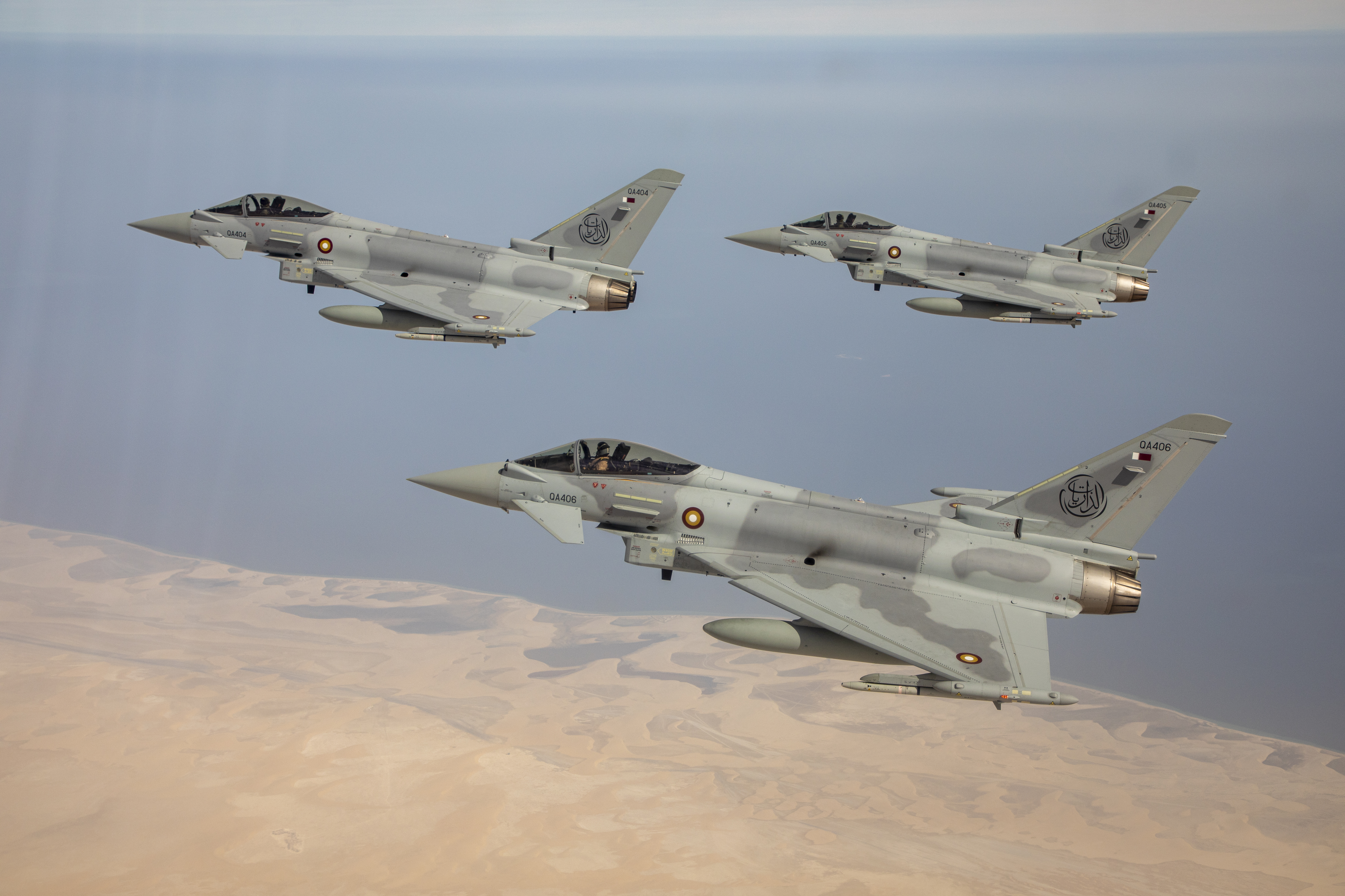 Image shows Typhoons flying in formation. 